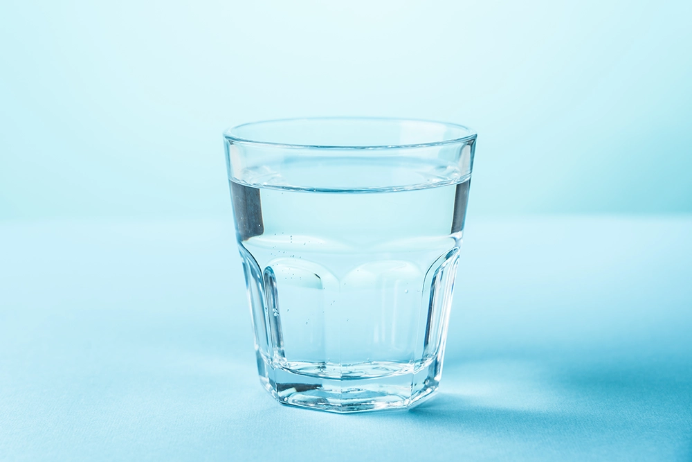 Glass of water to promote your health with Achieve Health Maumee